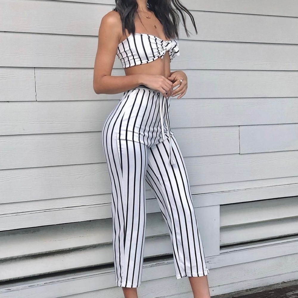 Two piece, black and white stripes, crop top and capri pant set.
